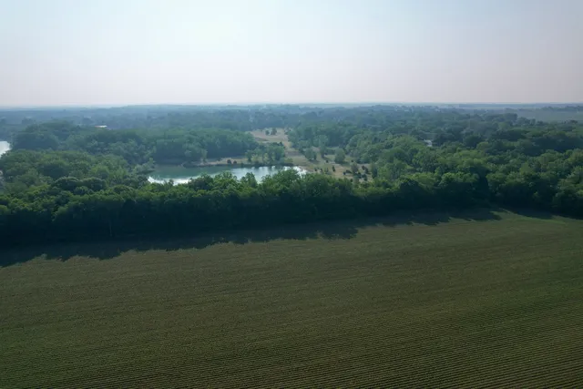 a view of a lake with a city