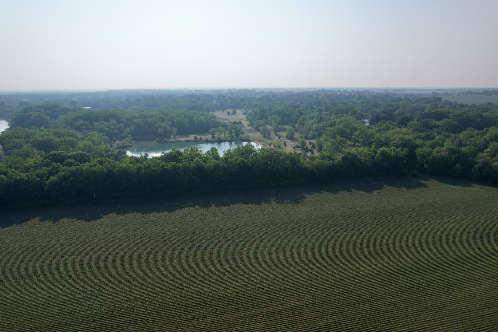 4141 East 2603rd Road Sheridan, IL 60551 - Photo 10 of 48 a view of a lake with a city
