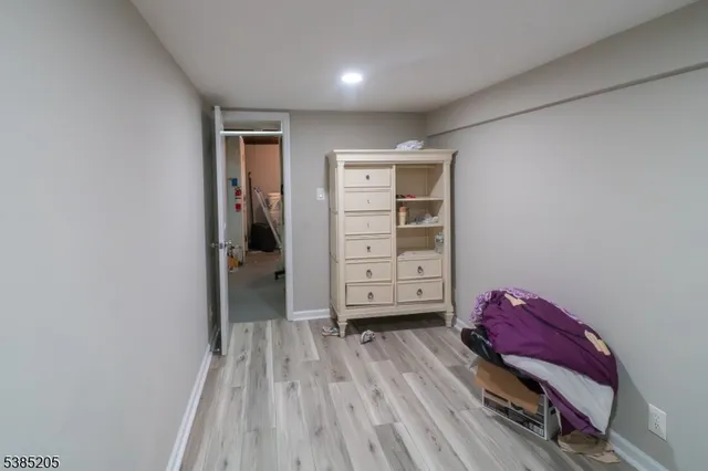 wooden floor and closet in a room
