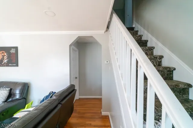 a view of a hallway with staircase