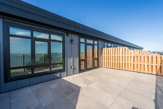 a view of a room with a large window