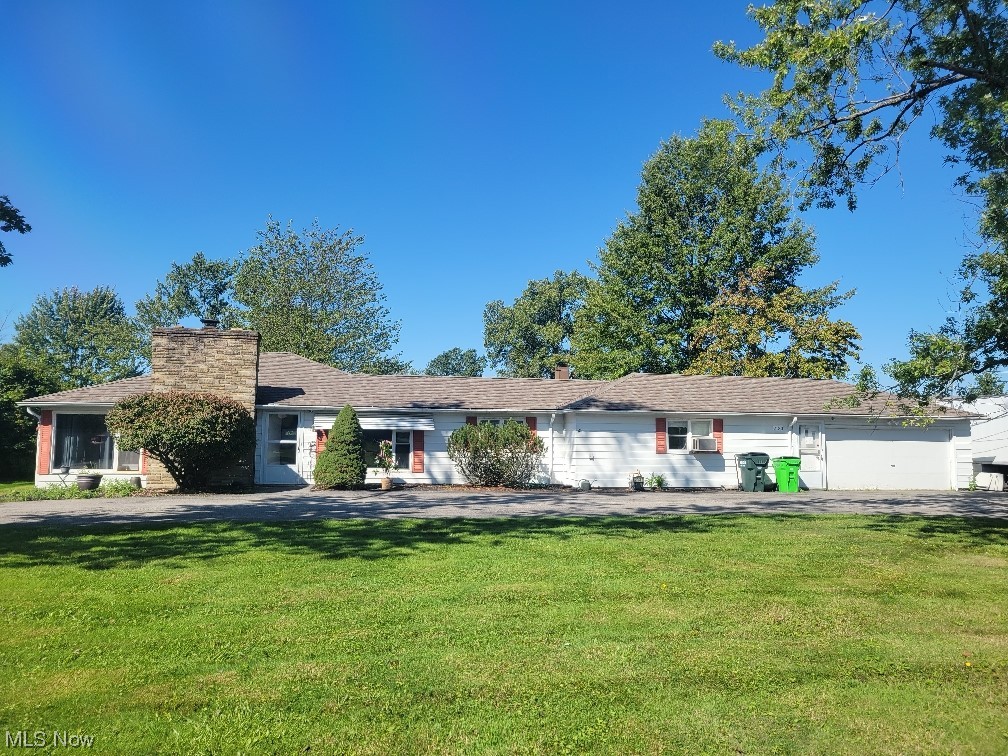 2130 Lander Road Mayfield Heights, OH 44124 - Photo 1 of 1 Ranch-style house with a front yard