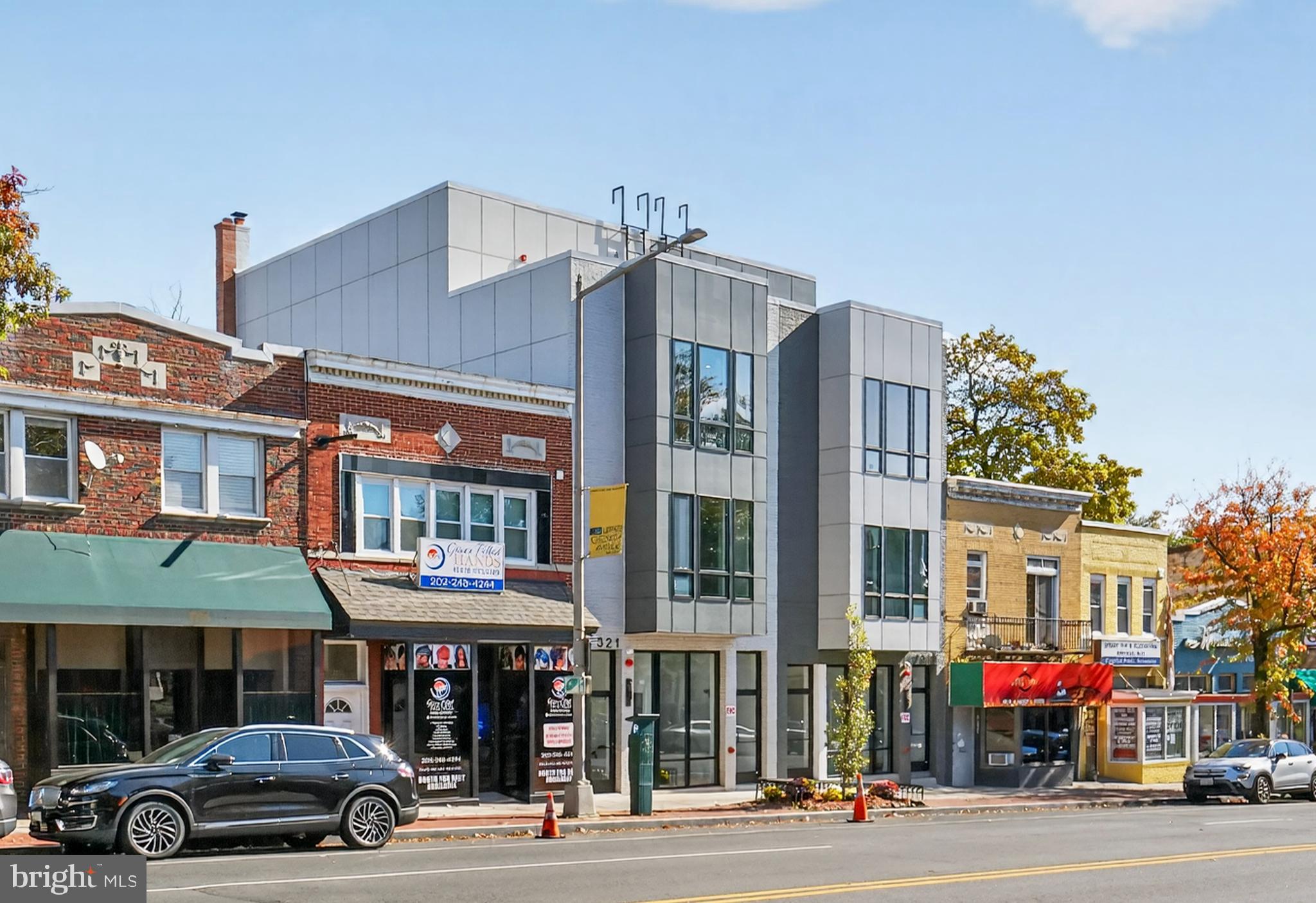 7319 Georgia Avenue Northwest Washington, DC 20012 - Photo 2 of 39 Modern architecture meets vibrant storefronts.