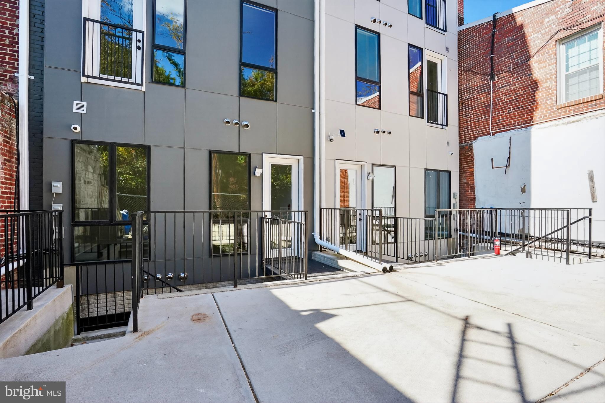 7319 Georgia Avenue Northwest Washington, DC 20012 - Photo 37 of 39 Modern urban living with stylish exteriors.