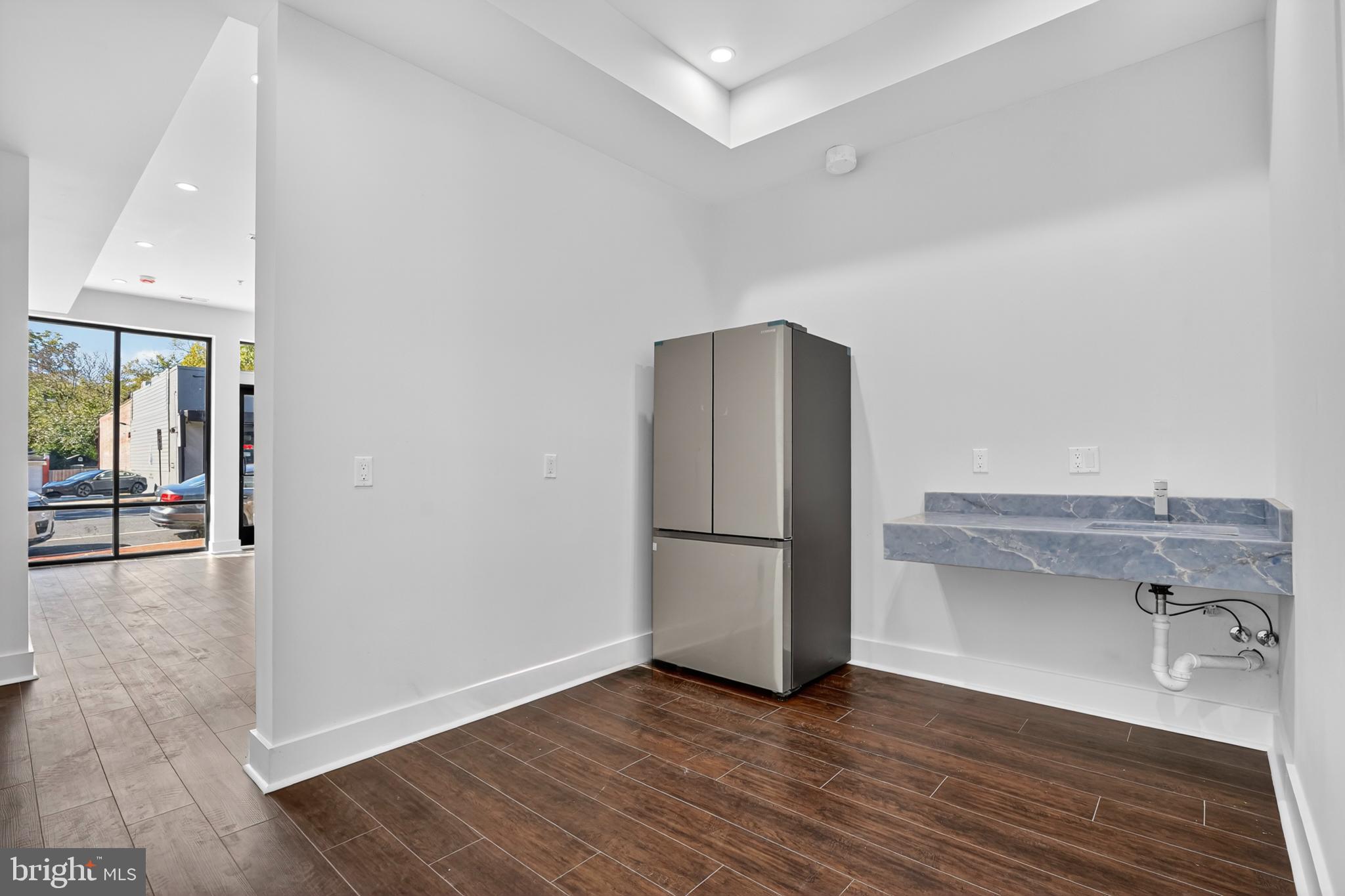 7319 Georgia Avenue Northwest Washington, DC 20012 - Photo 7 of 39 Modern kitchen space with sleek finishes.
