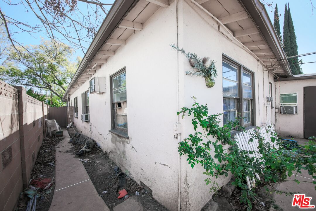 5663 Kester Avenue Van Nuys, CA 91411 - Photo 12 of 15 a view of a house with brick walls