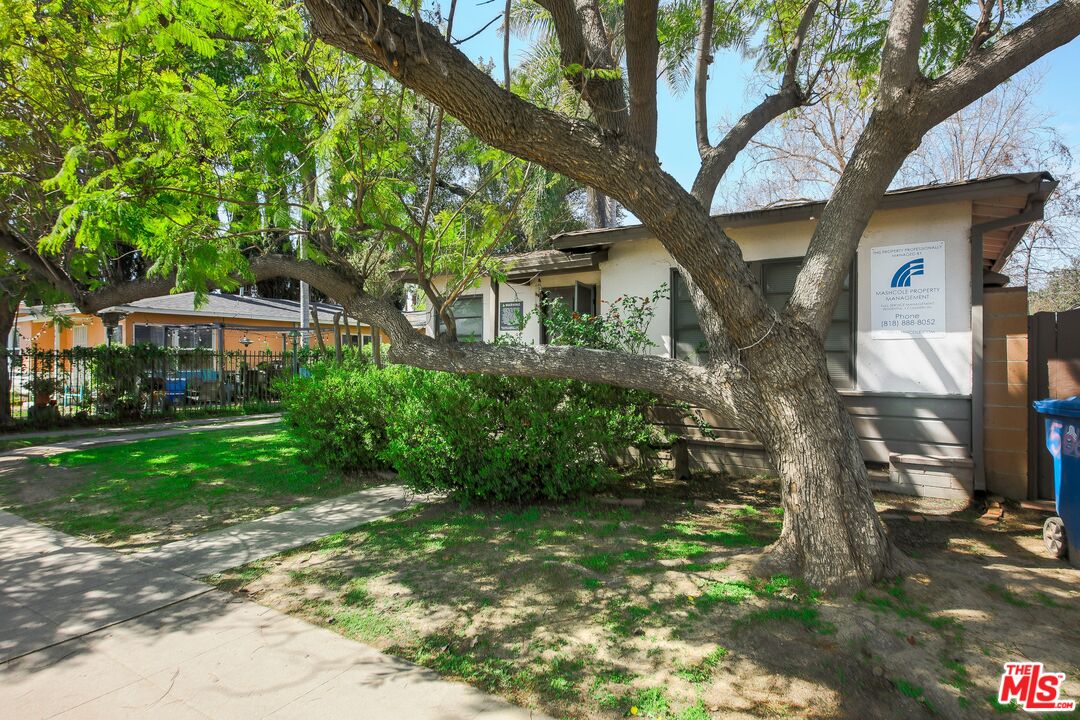 5663 Kester Avenue Van Nuys, CA 91411 - Photo 3 of 15 a house in middle of forest