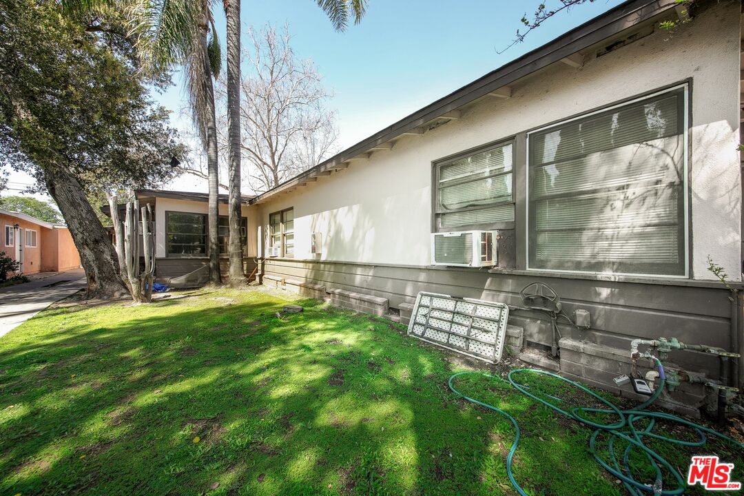5663 Kester Avenue Van Nuys, CA 91411 - Photo 4 of 15 a view of house with backyard