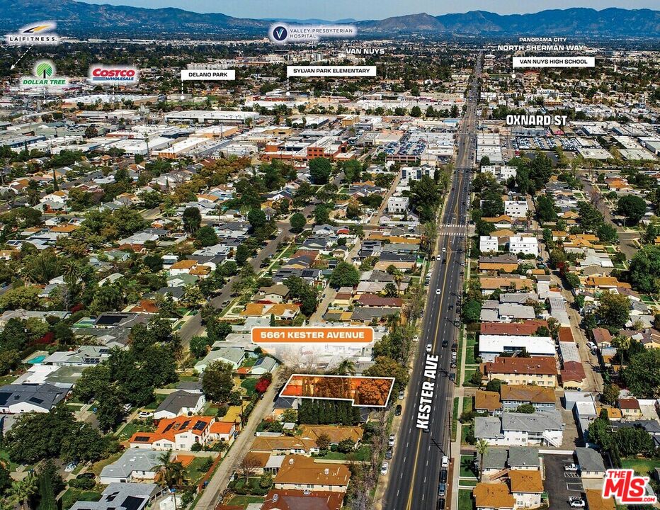 5663 Kester Avenue Van Nuys, CA 91411 - Photo 5 of 15 an aerial view of residential houses with city view