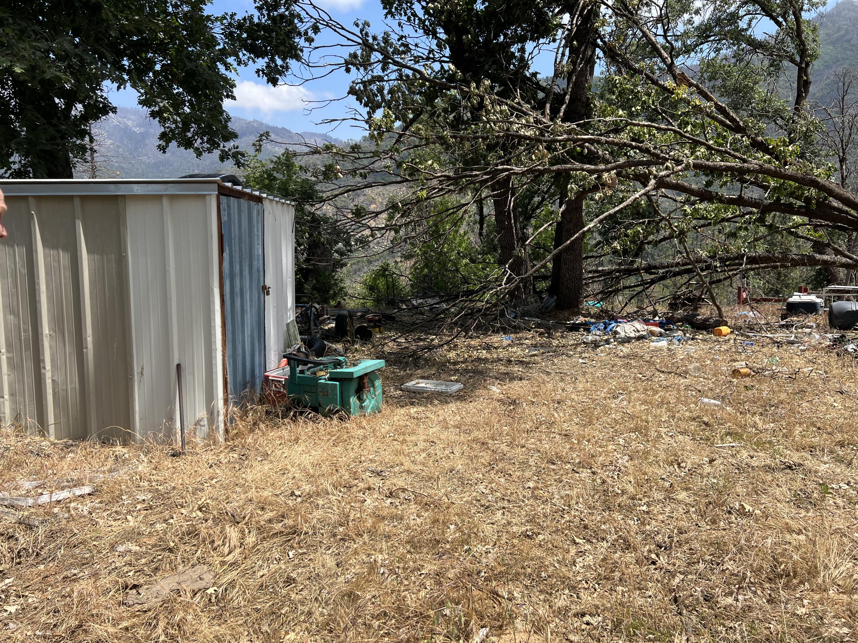 0 Balch Park Road Springville, CA 93265 - Photo 24 of 27 a backyard of a house with table and chairs