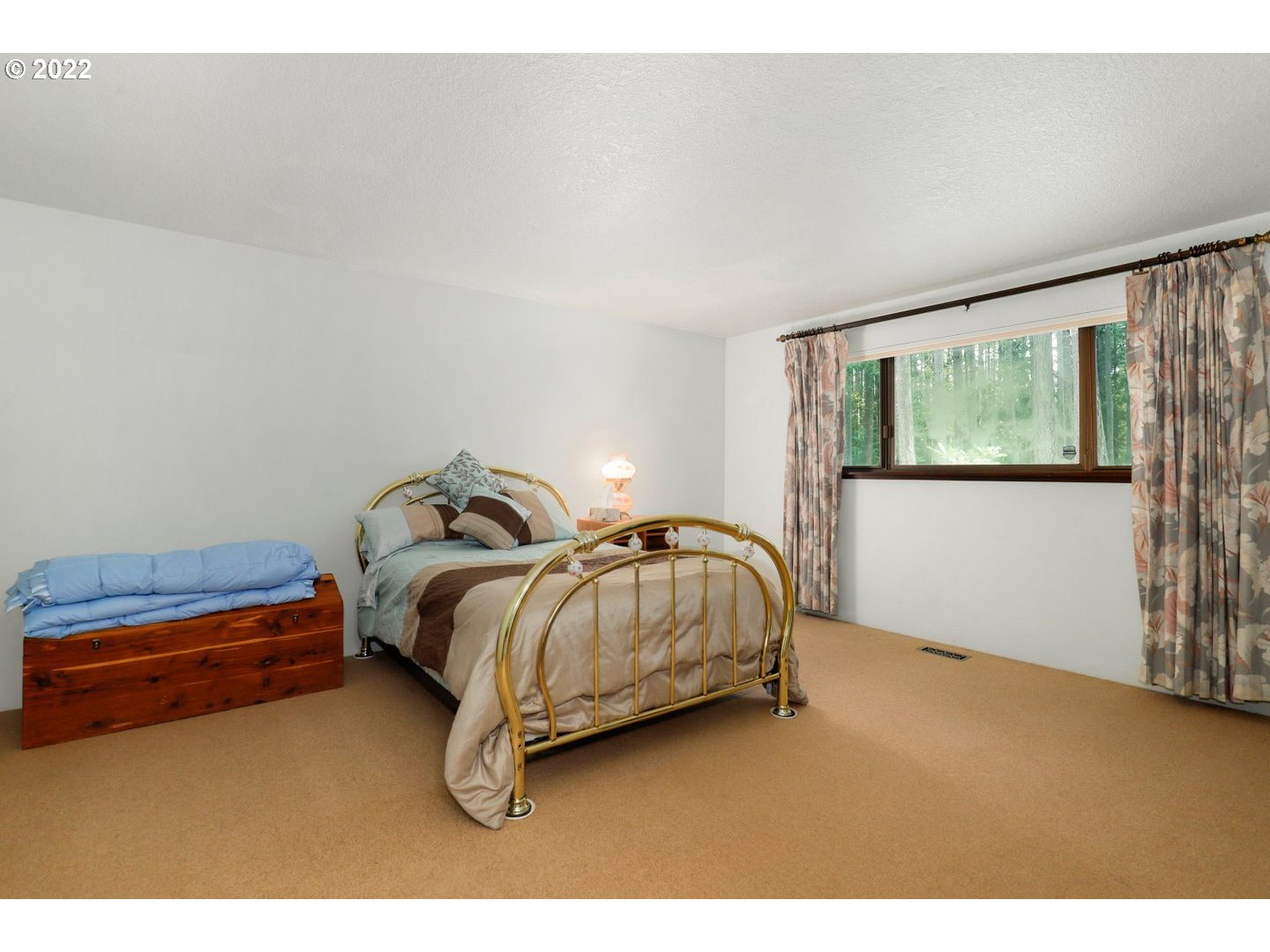 19627 South Ferguson Road Oregon City, OR 97045 - Photo 21 of 32 a bedroom with a bed and window
