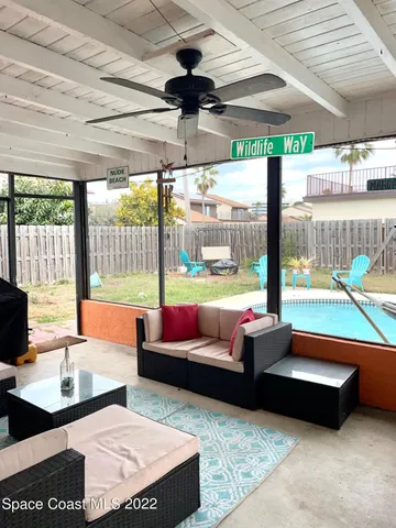 a living room with couch and a table