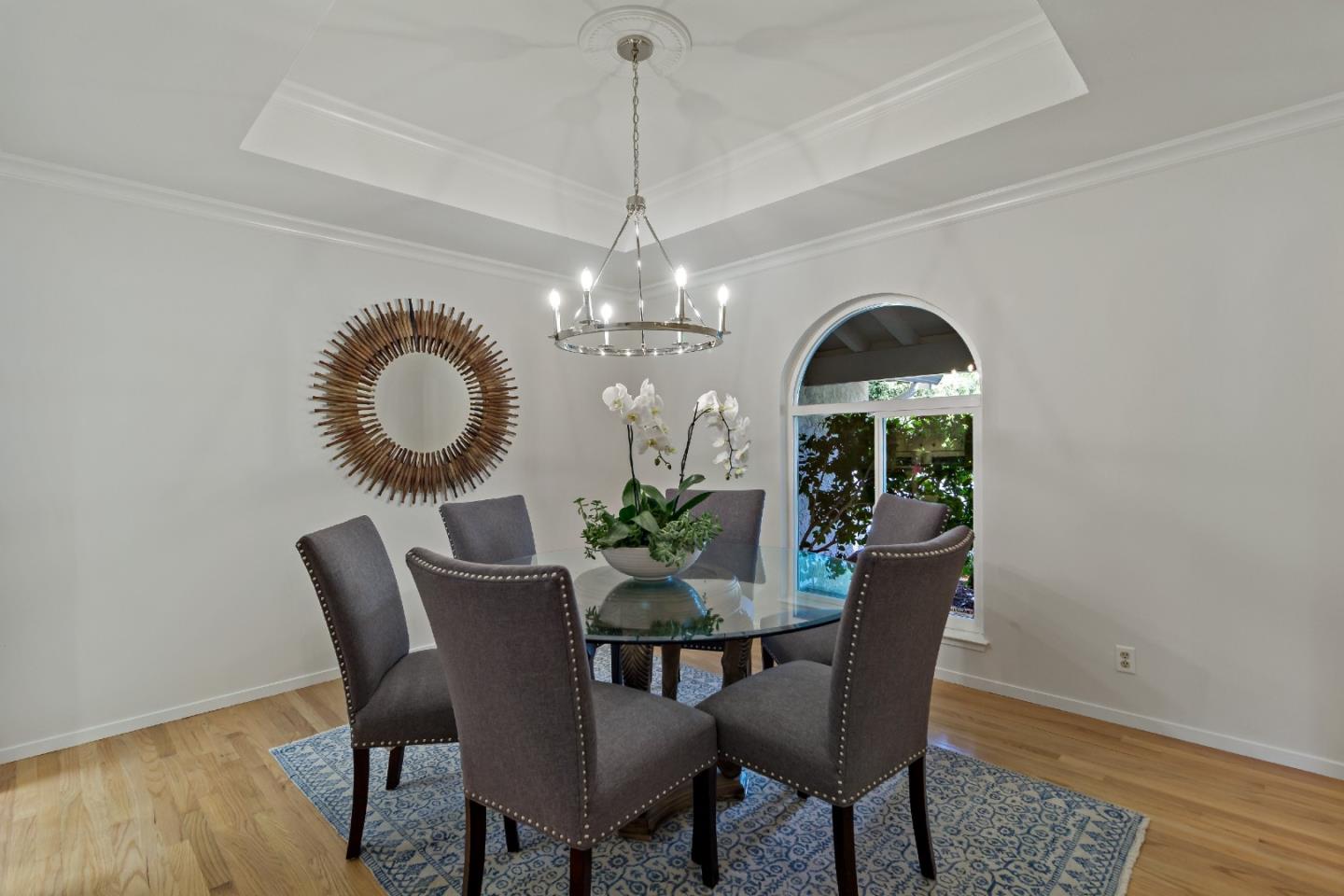 869 Terrace Drive Los Altos, CA 94024 - Photo 13 of 86 a dining room with furniture a potted plant and wooden floor