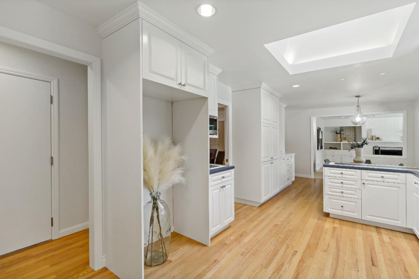 869 Terrace Drive Los Altos, CA 94024 - Photo 28 of 86 a kitchen with stainless steel appliances granite countertop a refrigerator and a stove top oven