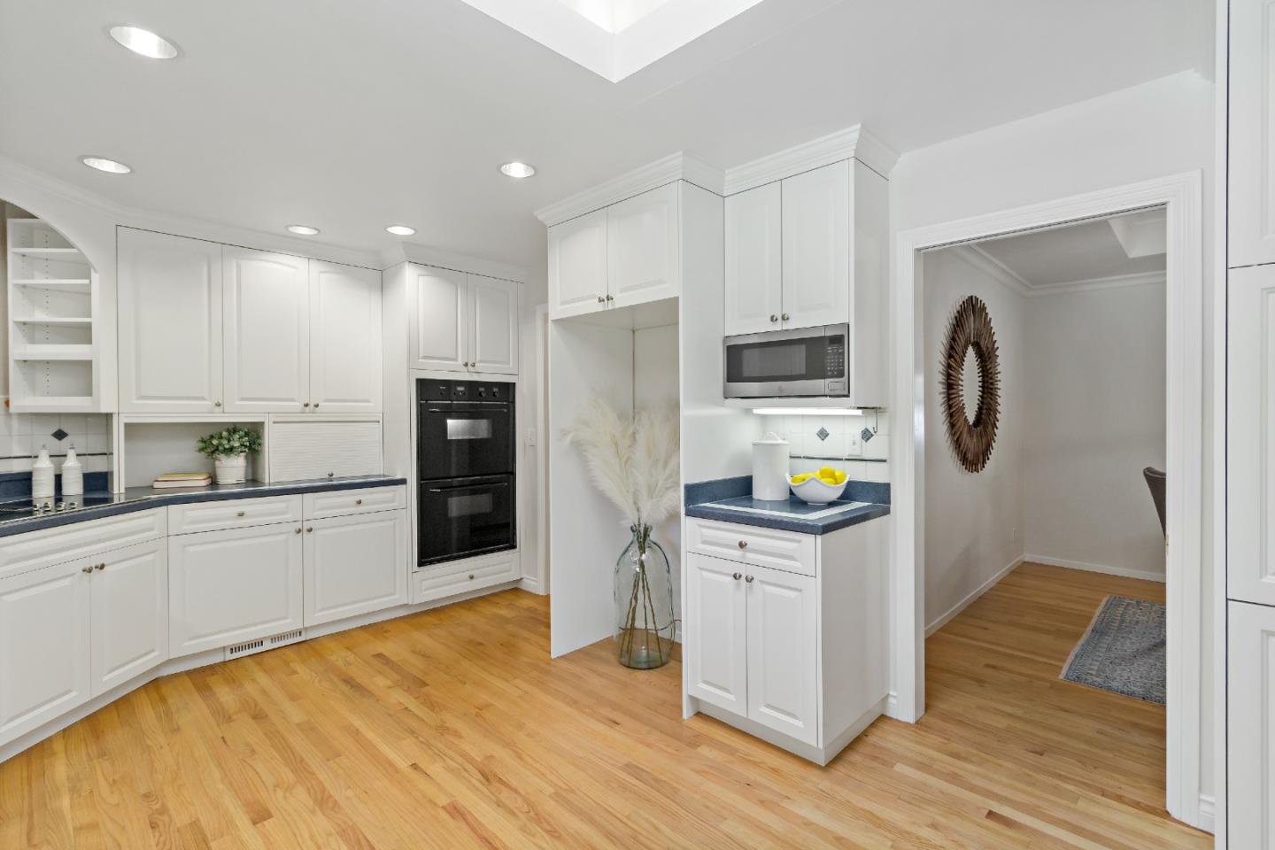 869 Terrace Drive Los Altos, CA 94024 - Photo 29 of 86 a kitchen with stainless steel appliances granite countertop a refrigerator and a stove top oven