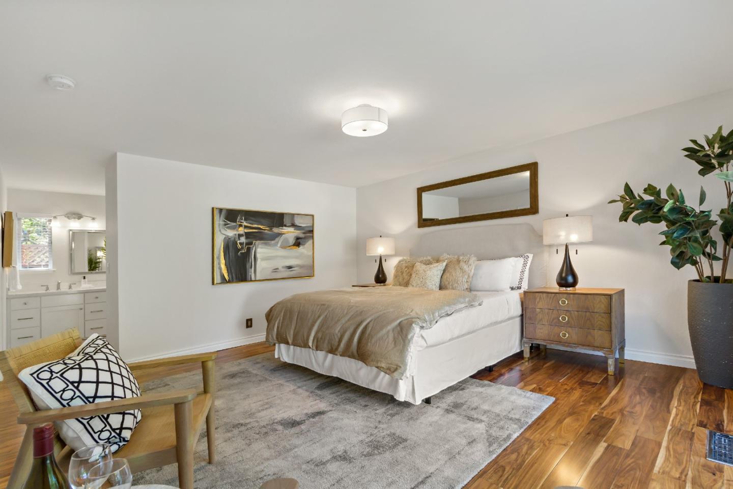 869 Terrace Drive Los Altos, CA 94024 - Photo 43 of 86 a spacious bedroom with a bed and a table