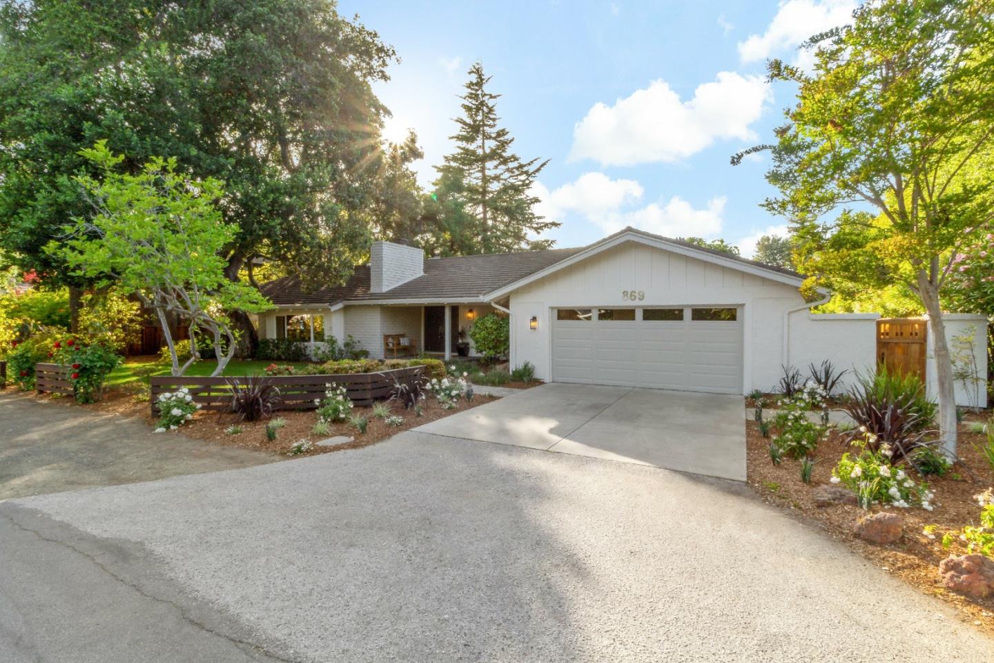 869 Terrace Drive Los Altos, CA 94024 - Photo 5 of 86 a view of a house with a patio and a garden