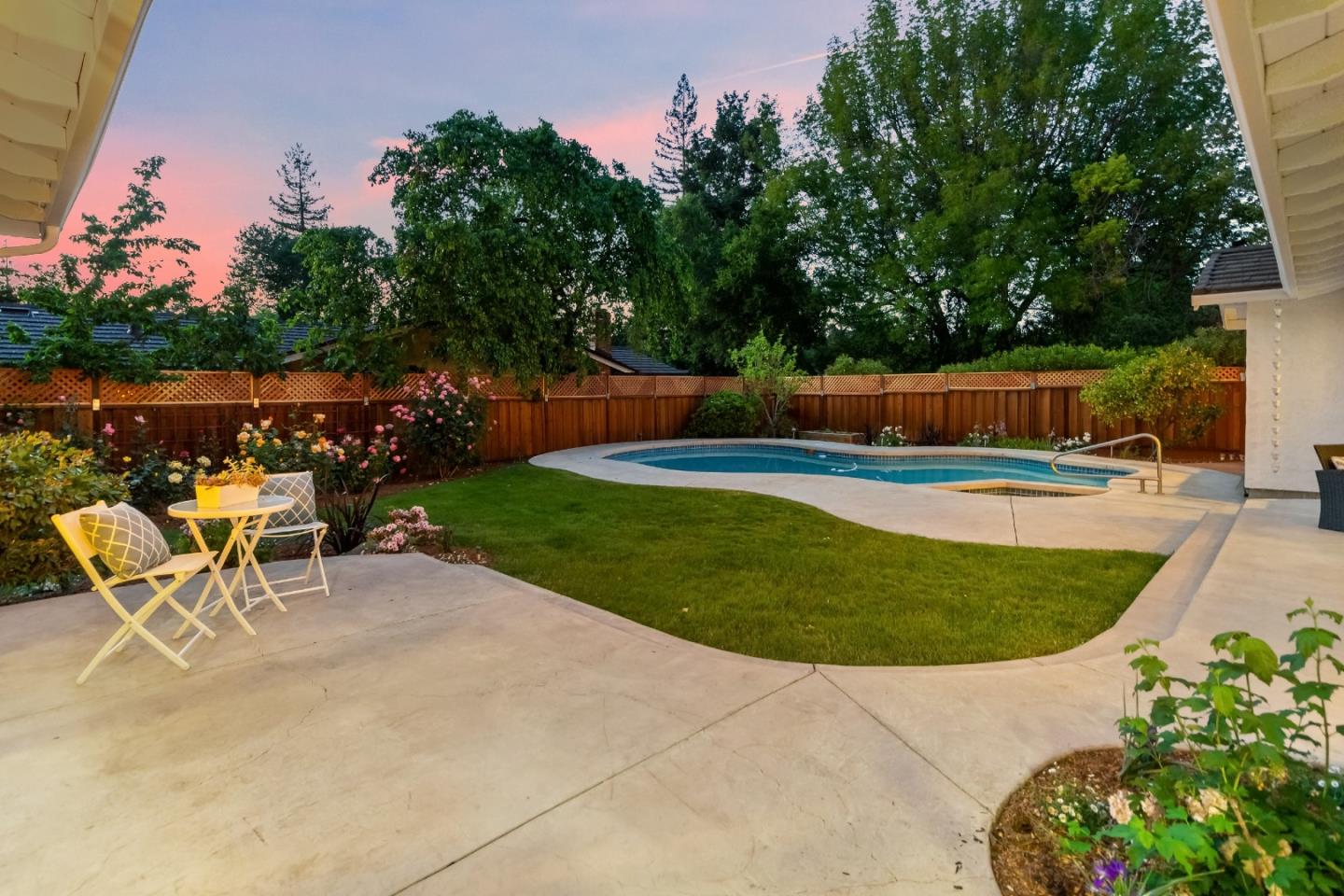 869 Terrace Drive Los Altos, CA 94024 - Photo 65 of 86 a view of a swimming pool with a patio