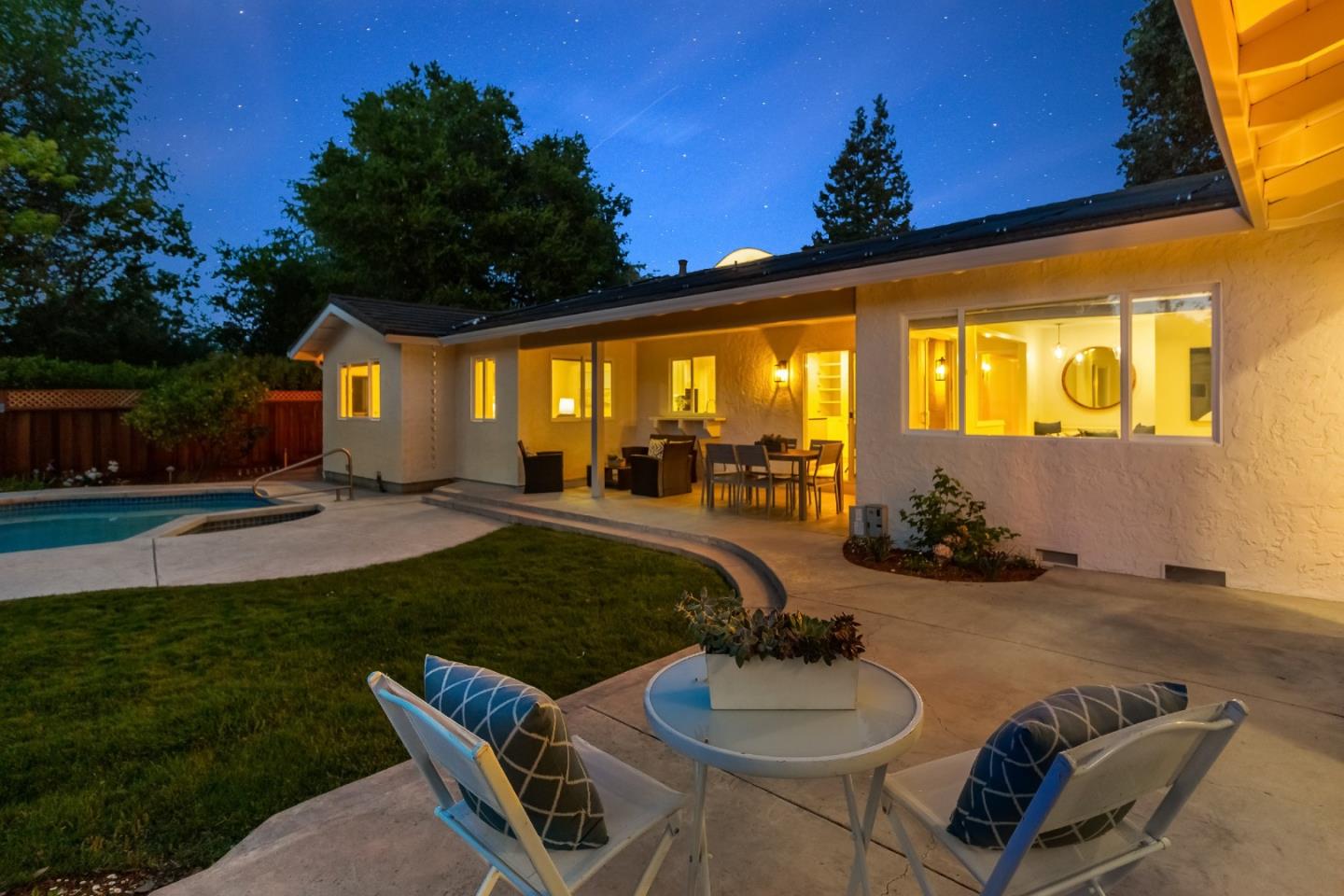 869 Terrace Drive Los Altos, CA 94024 - Photo 67 of 86 a view of a patio with couches table and chairs and potted plants
