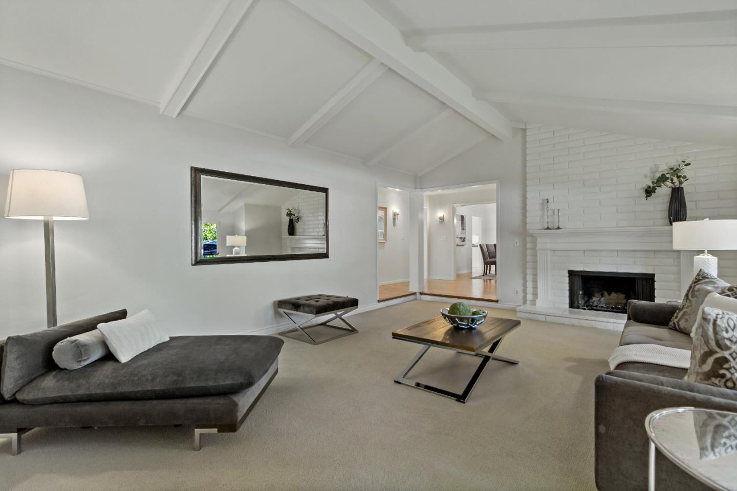 869 Terrace Drive Los Altos, CA 94024 - Photo 10 of 86 a living room with furniture a fireplace and a table