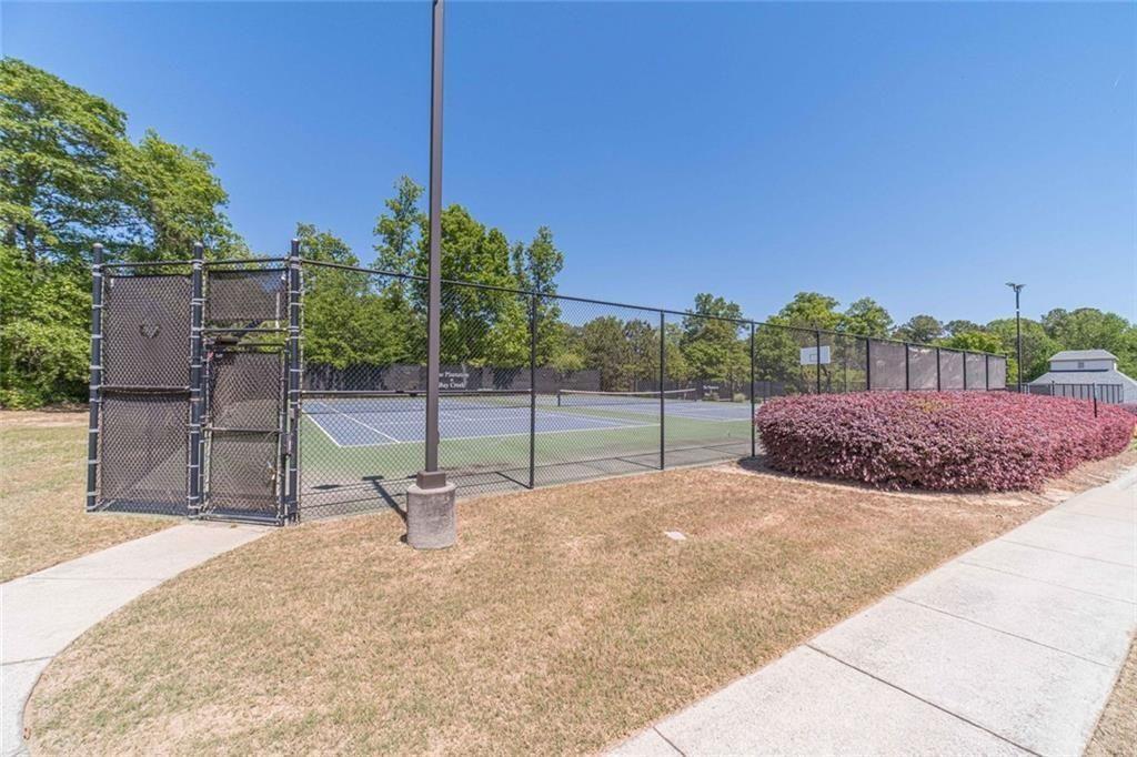 395 Amberbrook Circle Grayson, GA 30017 - Photo 65 of 66 a view of backyard with green space