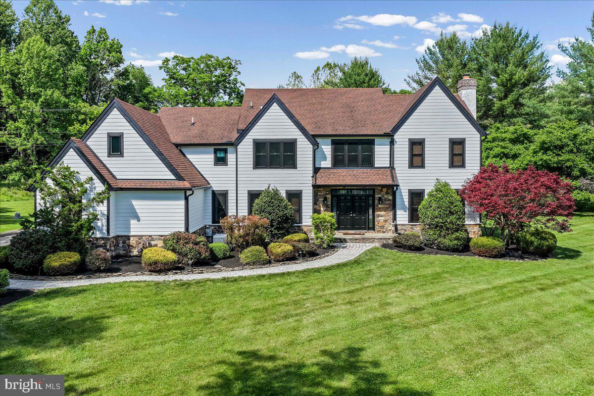51 Ridings Way Chadds Ford, PA 19317 - Photo 1 of 57 a house with garden in front of it