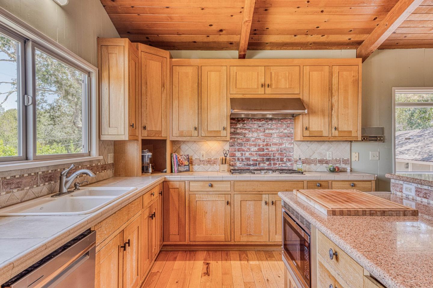 394 Mesa Road Salinas, CA 93908 - Photo 14 of 53 a kitchen with a sink stove and cabinets
