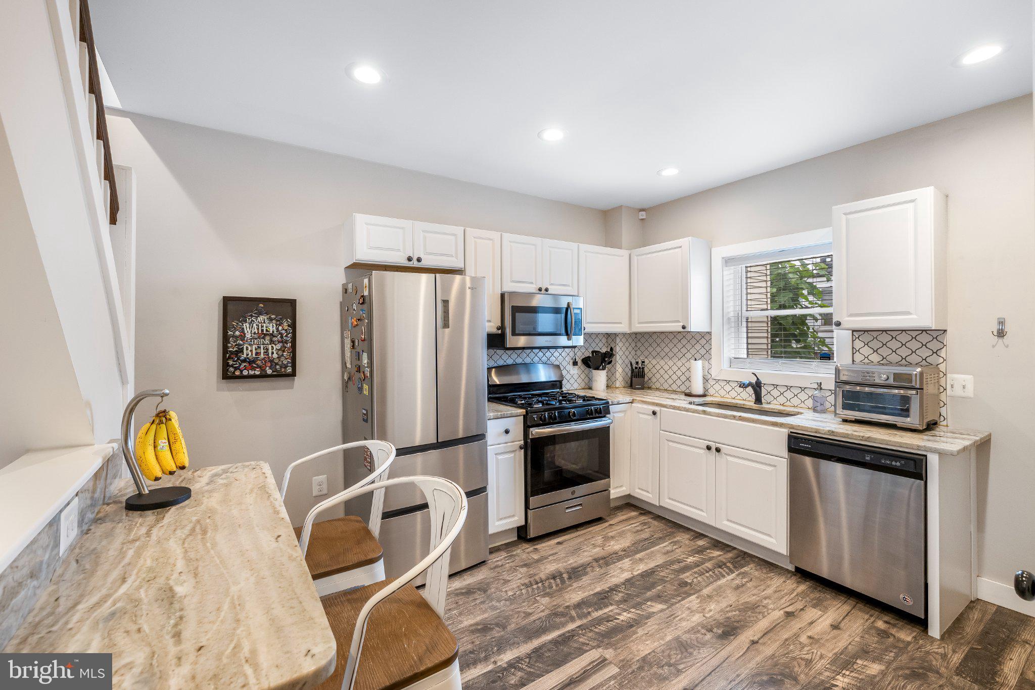 3240 Leverton Avenue Baltimore, MD 21224 - Photo 7 of 22 Modern kitchen with sleek finishes.