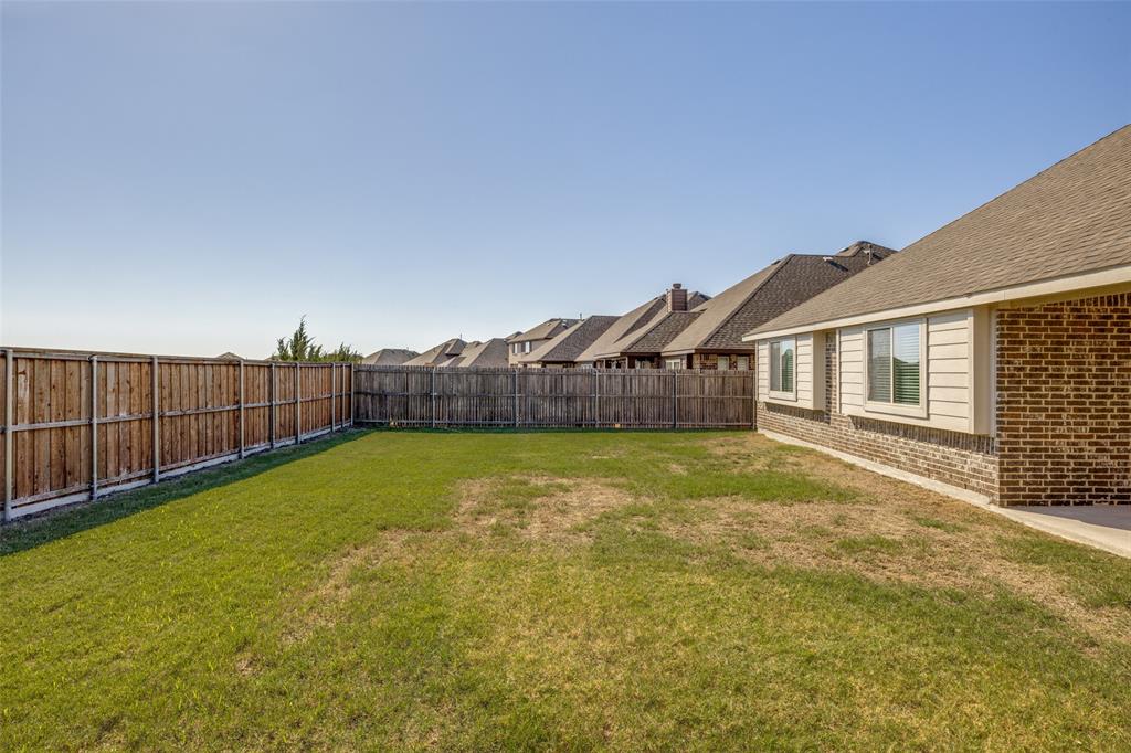 3405 Fletcher Road Heartland, TX 75114 - Photo 24 of 30 Sizable backyard for entertaining family and friends.