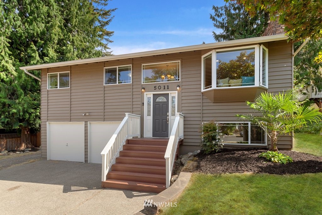 5011 Northeast 24th Street Renton, WA 98059 - Photo 3 of 34 a view of a house with backyard and sitting area