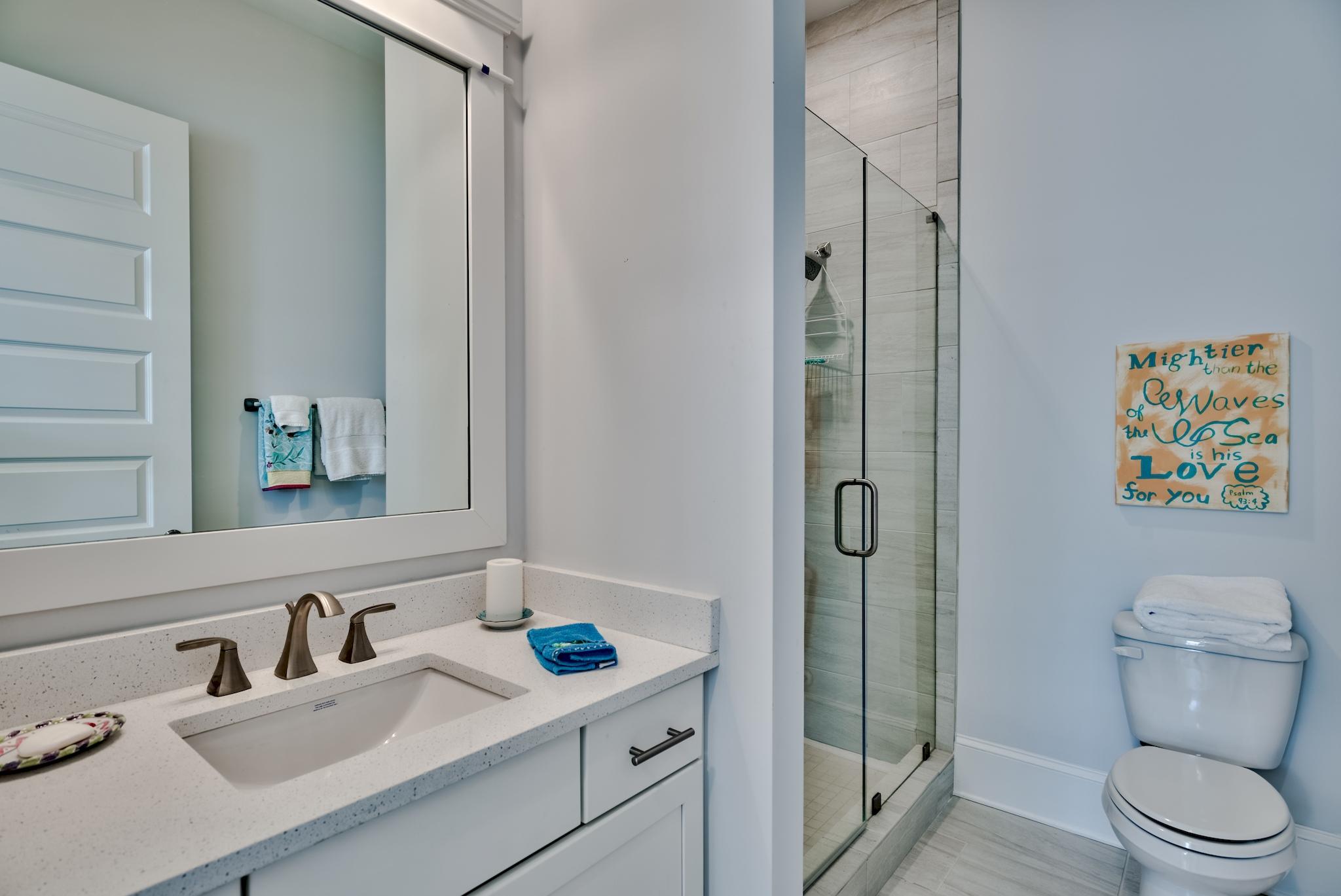 114 Clipper Street Inlet Beach, FL 32461 - Photo 13 of 64 a bathroom with a sink a toilet and shower