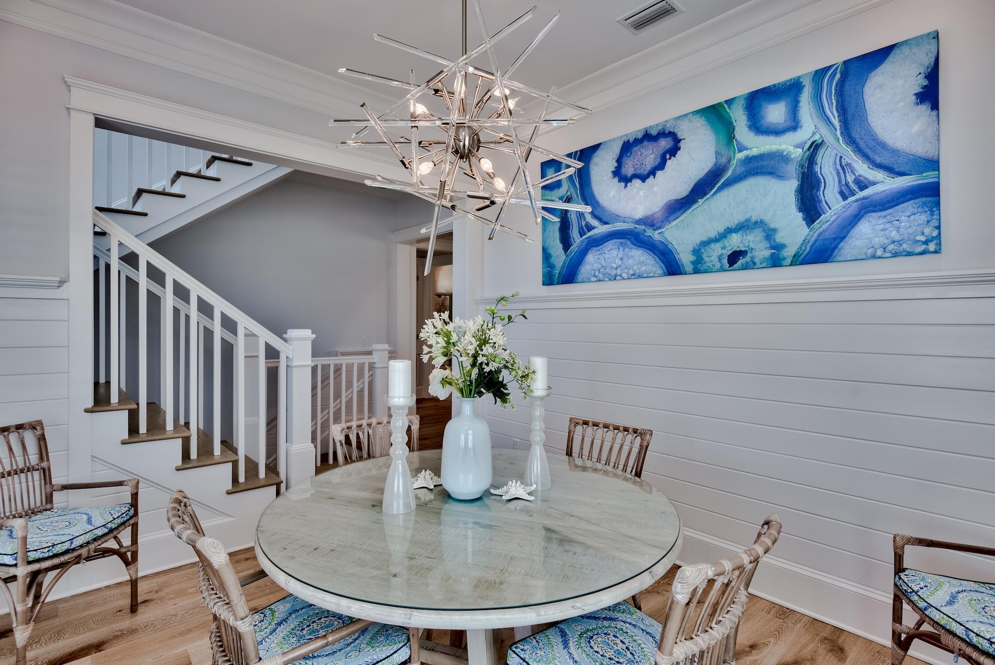 114 Clipper Street Inlet Beach, FL 32461 - Photo 19 of 64 a view of a dining room with furniture and wooden floor
