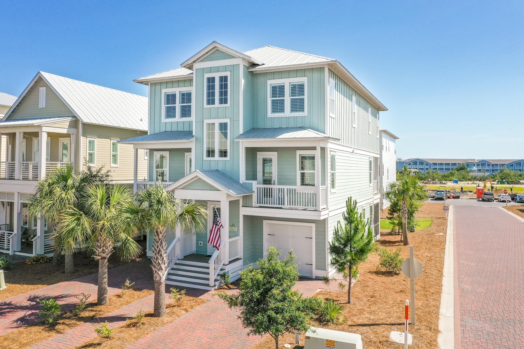 114 Clipper Street Inlet Beach, FL 32461 - Photo 2 of 64 a front view of a house with a yard