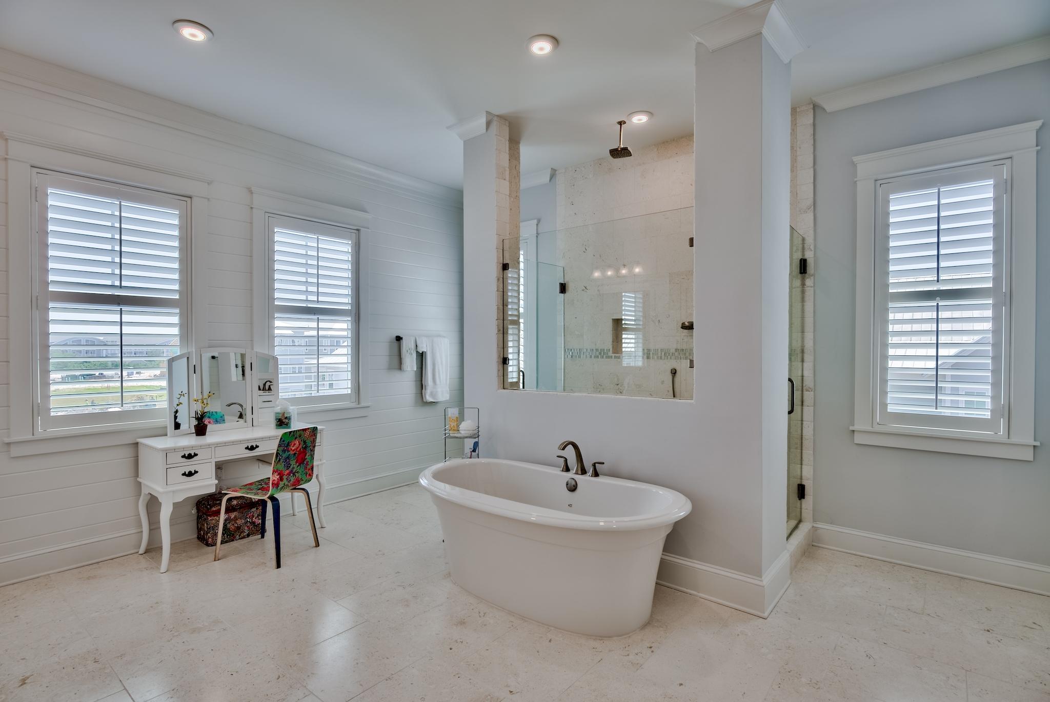 114 Clipper Street Inlet Beach, FL 32461 - Photo 22 of 64 a spacious bathroom with sink and mirror with bathtub