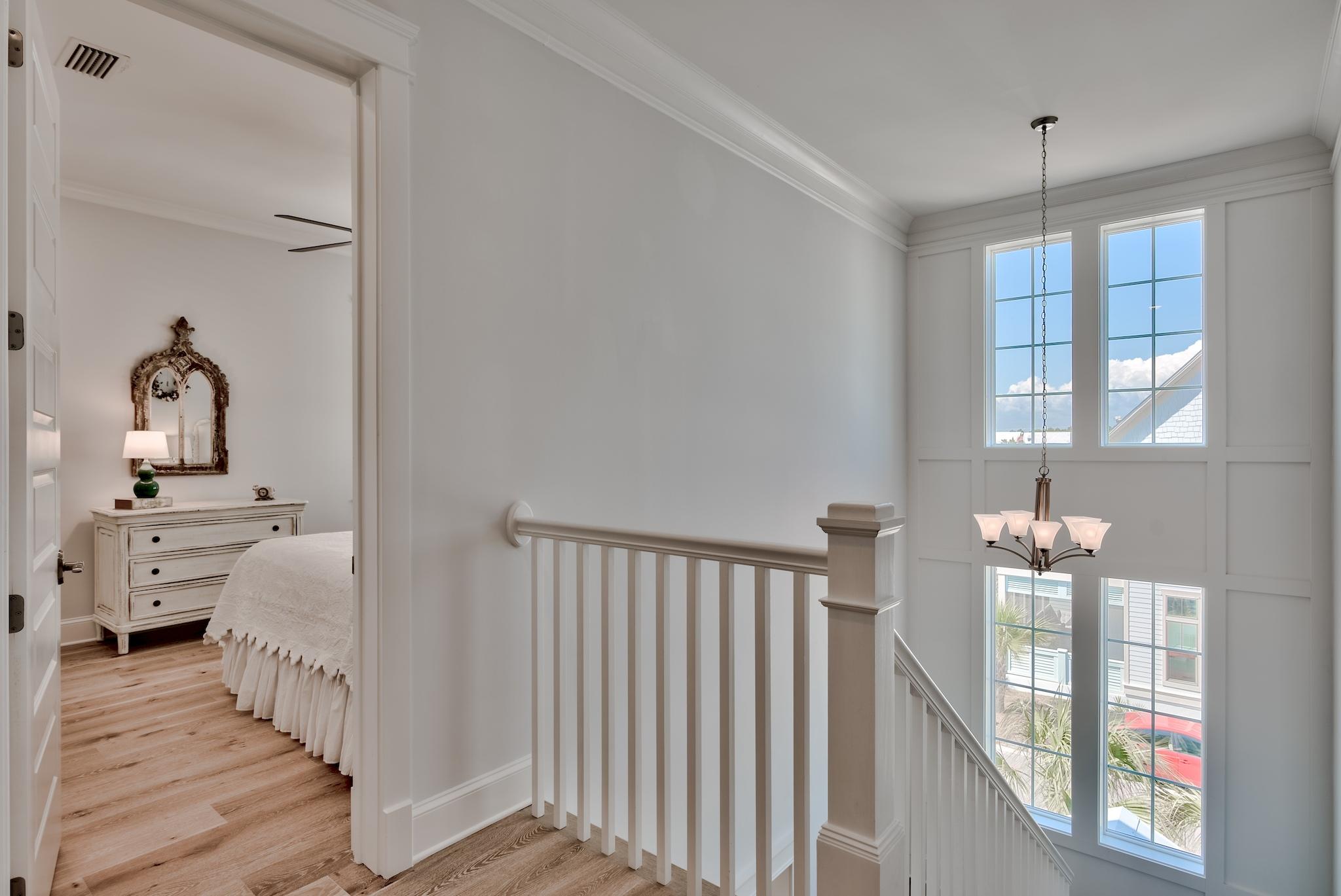114 Clipper Street Inlet Beach, FL 32461 - Photo 29 of 64 a view of a hallway to a livingroom with furniture