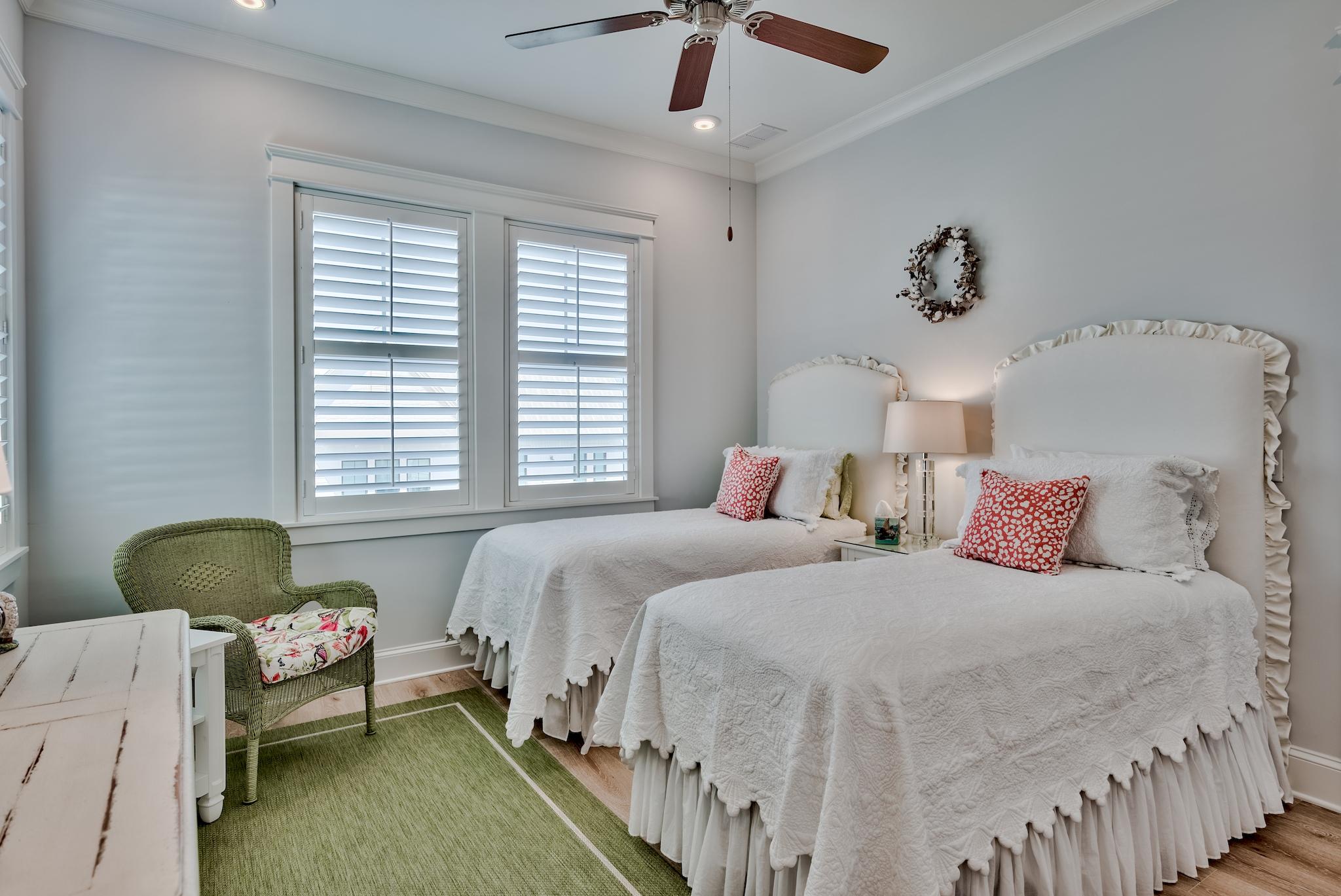 114 Clipper Street Inlet Beach, FL 32461 - Photo 30 of 64 a bedroom with two beds and a window