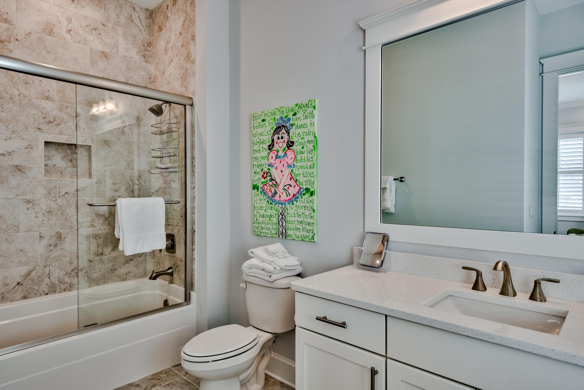 114 Clipper Street Inlet Beach, FL 32461 - Photo 31 of 64 a bathroom with a sink a toilet and shower