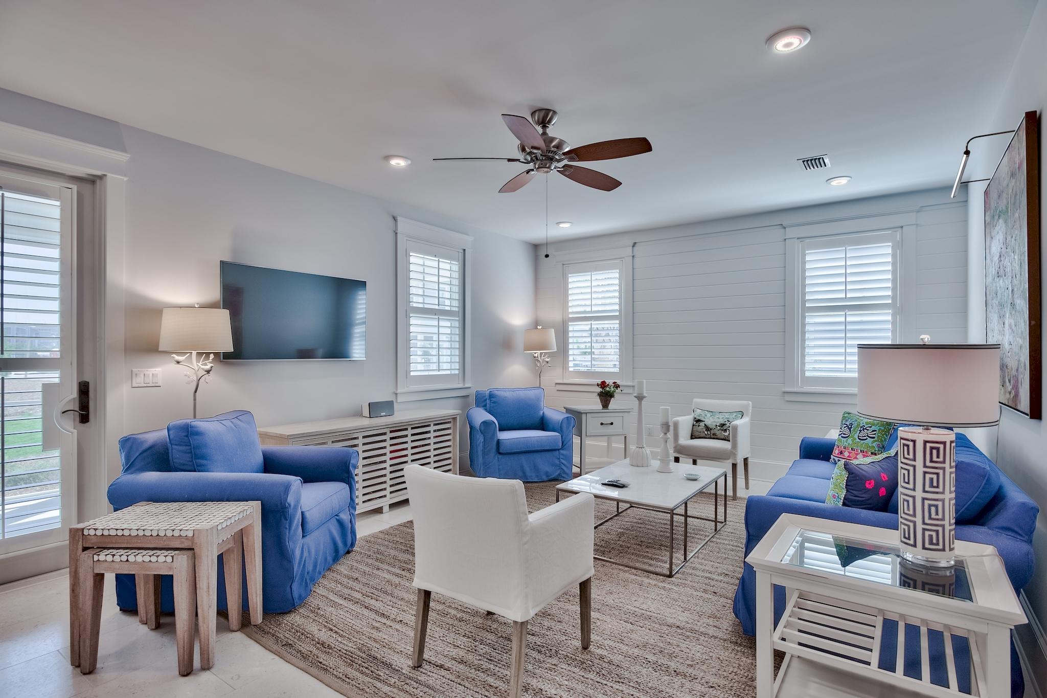 114 Clipper Street Inlet Beach, FL 32461 - Photo 32 of 64 a living room with furniture and a flat screen tv