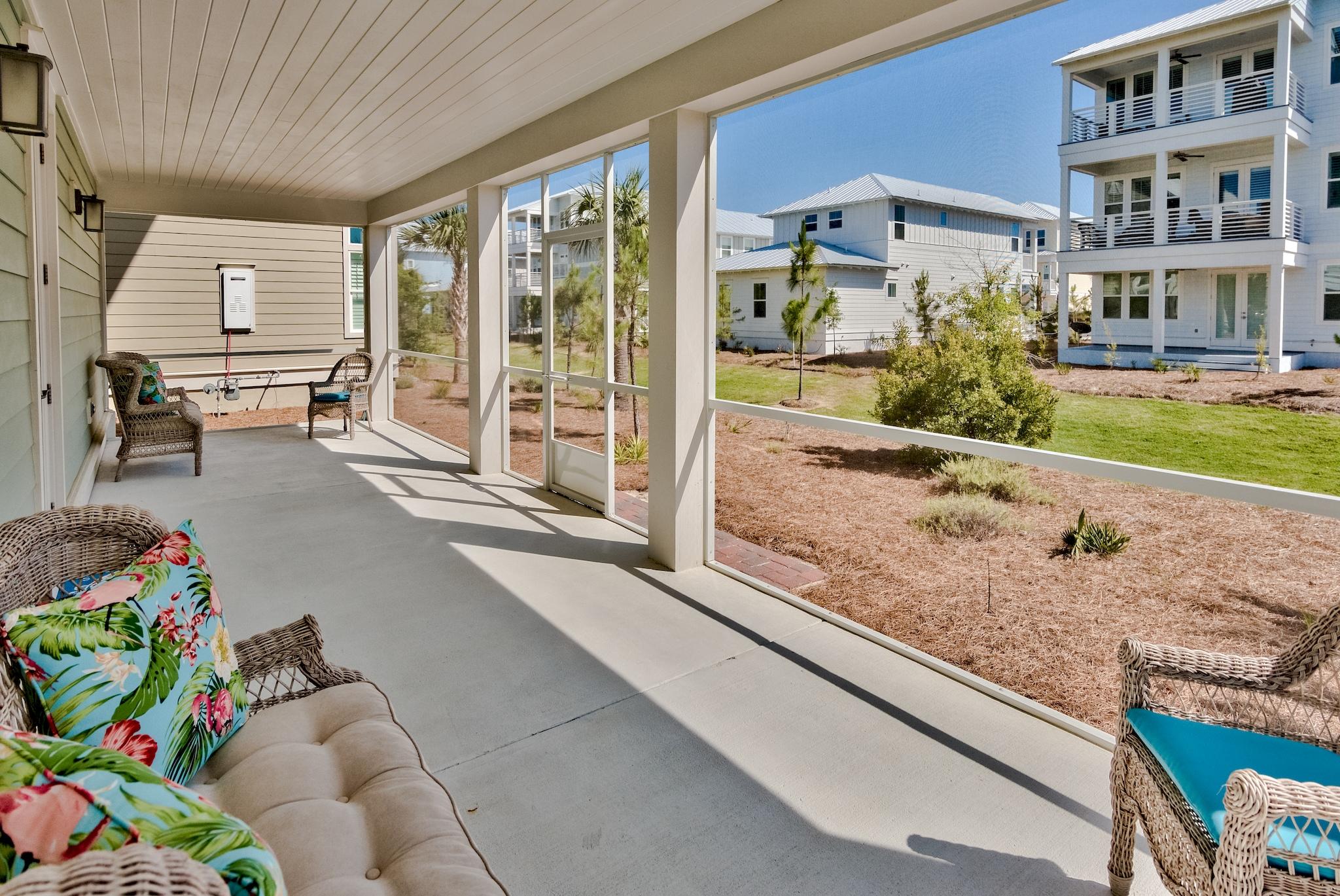 114 Clipper Street Inlet Beach, FL 32461 - Photo 36 of 64 a view of a porch with furniture and floor to ceiling window