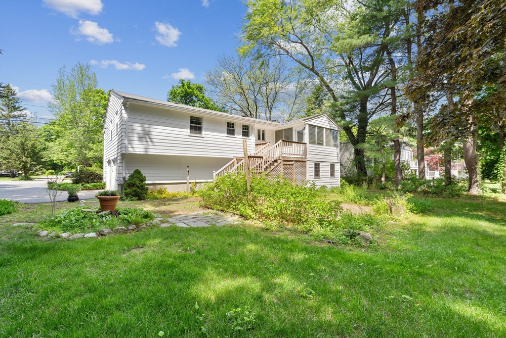 348 Belknap Road Framingham, MA 01701 - Photo 33 of 35 a front view of a house with a yard