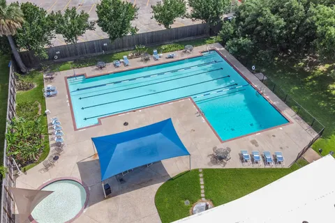 a view of outdoor sitting area with chairs