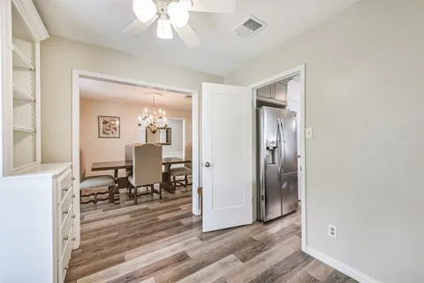a view of a livingroom from a hallway