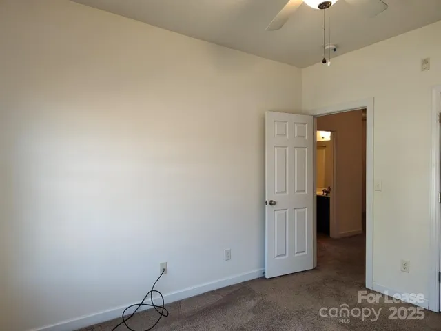 a bathroom with a sink toilet vanity and shower