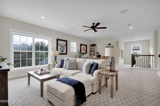 a kitchen with stainless steel appliances granite countertop a sink a stove and cabinets