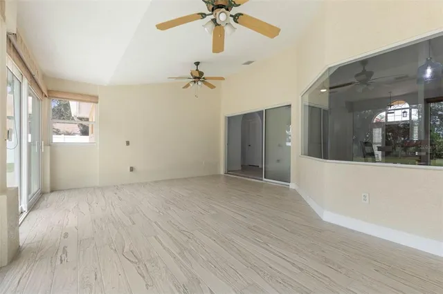 a bathroom with a granite countertop sink a vanity and a mirror