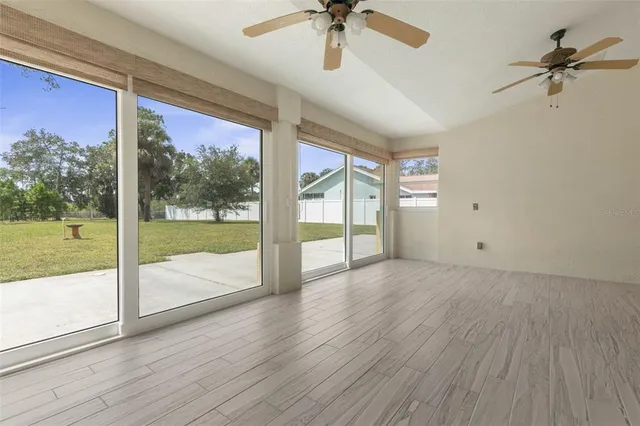 a white bath tub sitting next to a white toilet