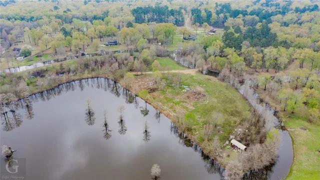 a view of mountains with green space