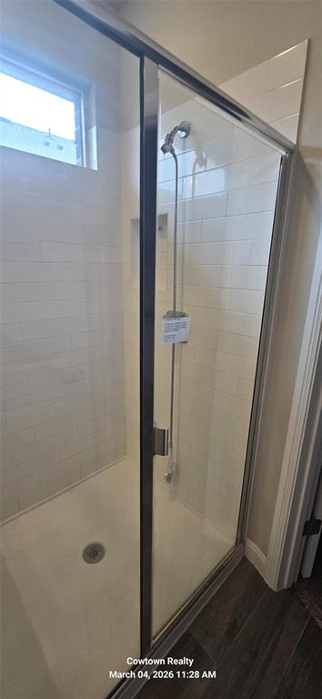 2340 Goodnight Ranch Drive Weatherford, TX 76087 - Photo 16 of 19 a bathroom with a glass shower door