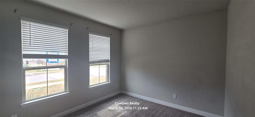 2340 Goodnight Ranch Drive Weatherford, TX 76087 - Photo 2 of 19 an empty room with windows