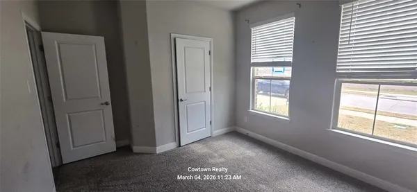 an empty room with windows